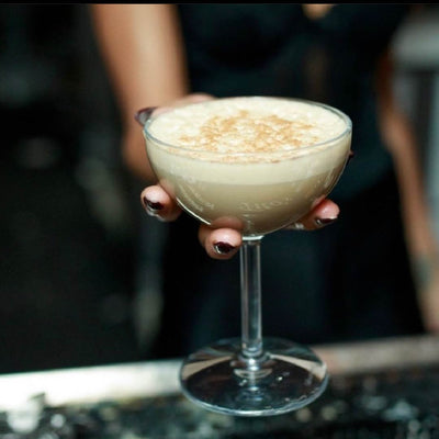 Unveiling the Timeless Elegance: The History of the Coupe Glass and Its Modern Drink Pairings